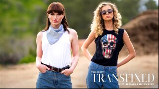 Natalie Mars and Haley Reed are standing together on the side of a desert road. Despite being in the middle of nowhere, the women are calm and confident, casting each other flirty looks as they intimately slide their hands into each other's back pockets. Then, they see him -- some rich guy flaunting his stuff as he drives down the road towards them. When he spots the two gorgeous women hitchhiking, he can't resist pulling over and inviting them into his convertible. Having just run into good fortune, he's all-too-happy to brag about it while a mysterious briefcase sits in the backseat. While Haley distracts the guy, Natalie sneaks a peek and discovers that the briefcase is loaded with money! As soon as she gets the chance, she gives Haley the signal. Within moments, the guy is unceremoniously dumped onto the side of the road. The girls speed off, gleefully throwing dollar bills to the wind, celebrating their win. They drive to the nearest cheap motel, as not to arouse suspicion, although they fully intend to arouse each other instead... As soon as the motel door is closed behind them and the briefcase is cast aside, they crash together in bed. As they strip each other down, they ire each other's naked bodies in the neon glow of the motel sign shining through the window. Basking in their glory, they eagerly go down on each other. As Natalie licks Haley's pussy, Haley sucks Natalie's cock... They can't get enough of the taste. Once they are both ready, they finally take each other for a wild ride. Yet, as they cuddle together in bed when they're exhausted, their life is about to get even wilder. Little do they know, the neon glow outside is soon replaced with the flashing red and blue of police lights...