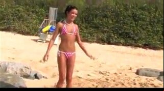 Nude beach - college girl photo shoot pee